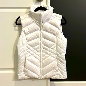 The North Face White Puffy Vest, size Small, only worn once
